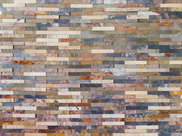 Fototapeta z różnokolorowymi kamiennymi płytkami w odcieniach beżu i szarości