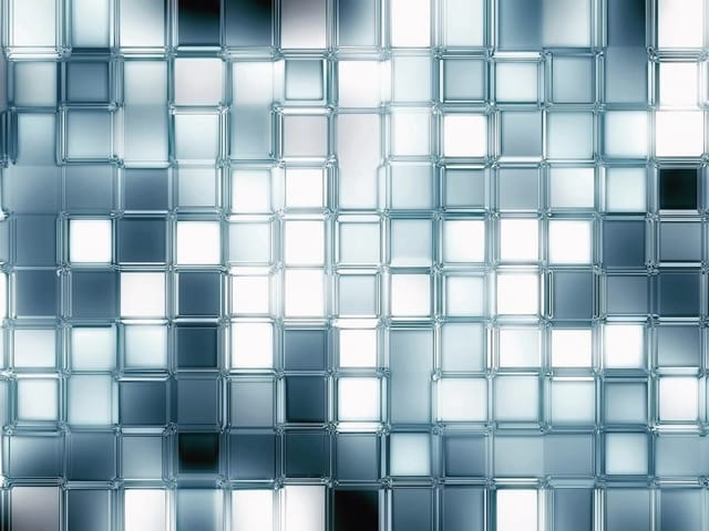 Fototapeta z szklanymi kwadratami w regularnej siatce z refleksami