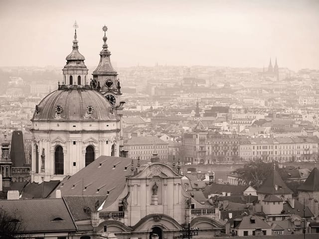 Fototapeta z kopułą barokowego kościoła i panoramą miasta