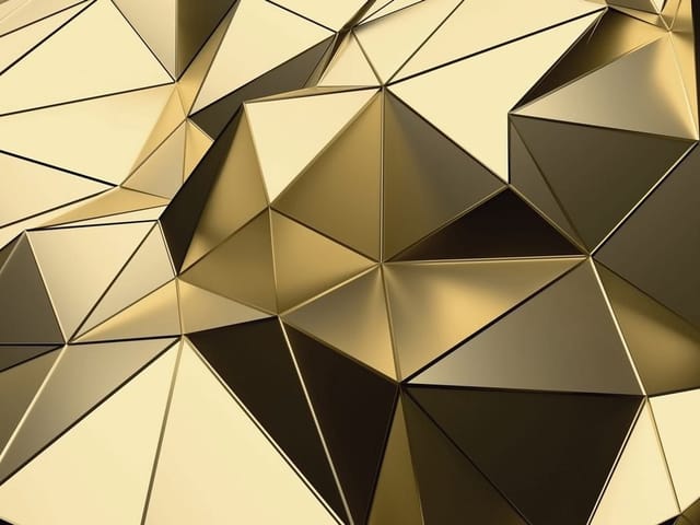 Fototapeta z geometrycznymi złotymi kształtami 3D w formie trójkątów
