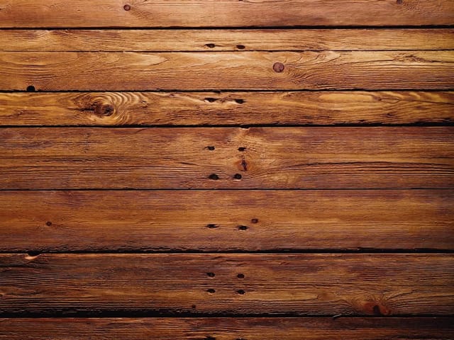 Fototapeta Drewniana powierzchnia z desek (mpn: 1794) Fototapeta z poziomymi drewnianymi deskami i widocznymi słojami