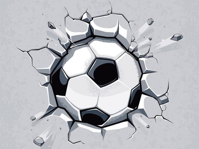 Fototapeta z piłką nożną przebijającą ścianę i odłamkami betonu
