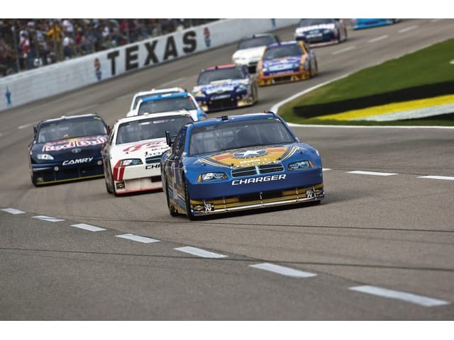 Fototapeta Wyścig samochodów na torze (kod: 1873) Fototapeta Wyścig samochodów na torze