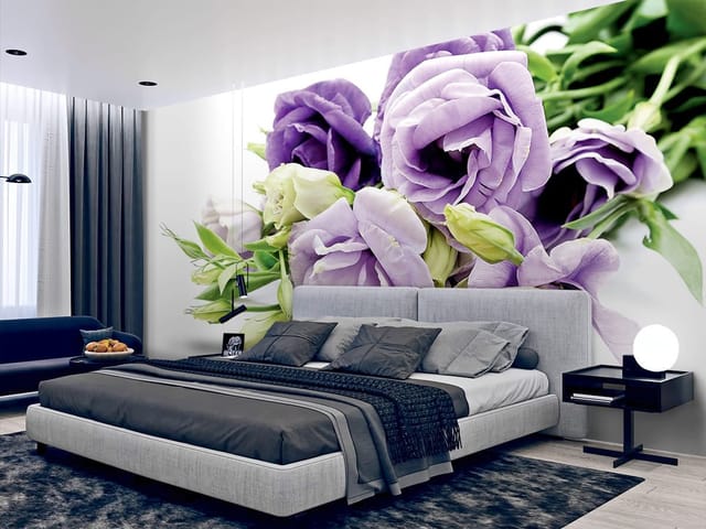 Fototapeta z bukietem fioletowych kwiatów i zielonymi liśćmi na białym tle