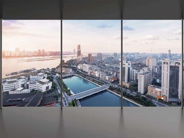 Fototapeta z panoramą miasta, rzeką i mostem w tle