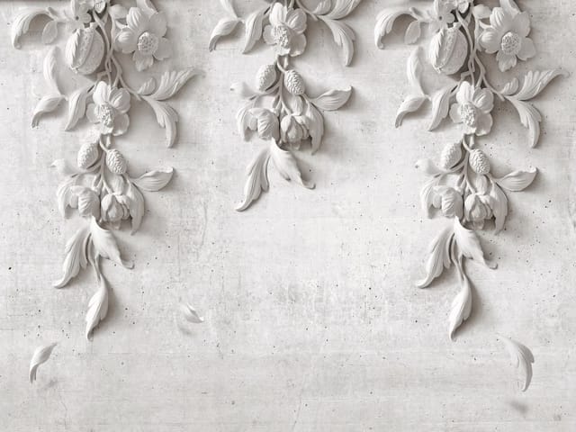 Fototapeta Reliefy kwiatowe na jasnej ścianie