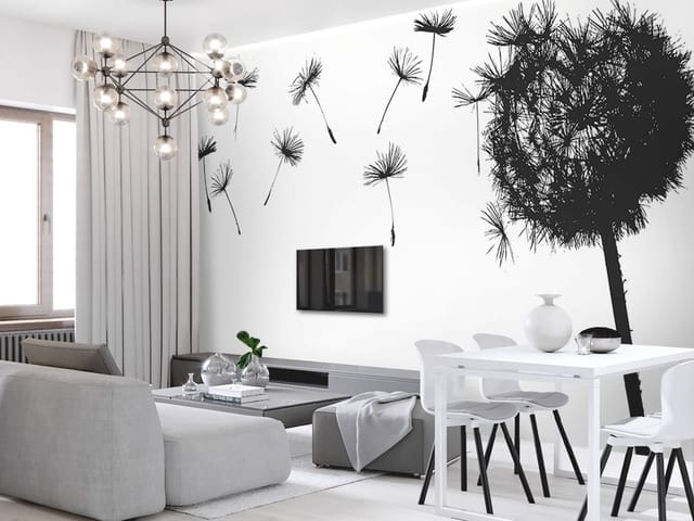 Fototapeta z dużym dmuchawcem i odlatującymi nasionami na białym tle