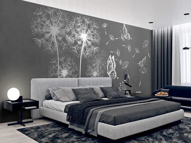 Fototapeta z dużymi białymi dmuchawcami na szarym tle i motylami