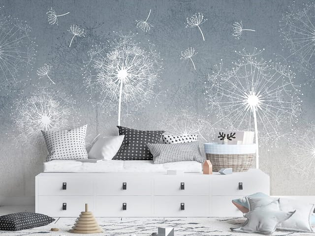 Fototapeta z białymi dmuchawcami na szarym tle i unoszącymi się nasionami