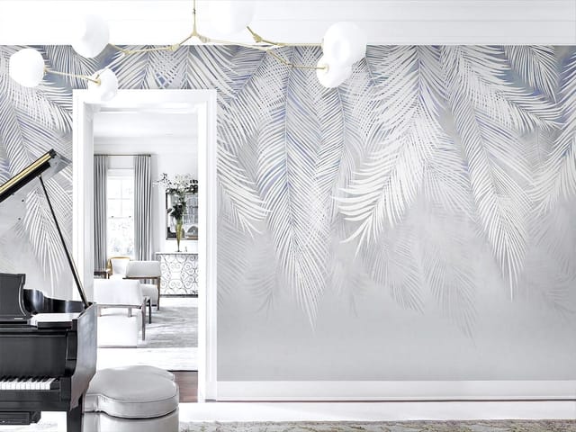 Fototapeta z białymi liśćmi palmowymi na szarym tle z delikatnym cieniowaniem