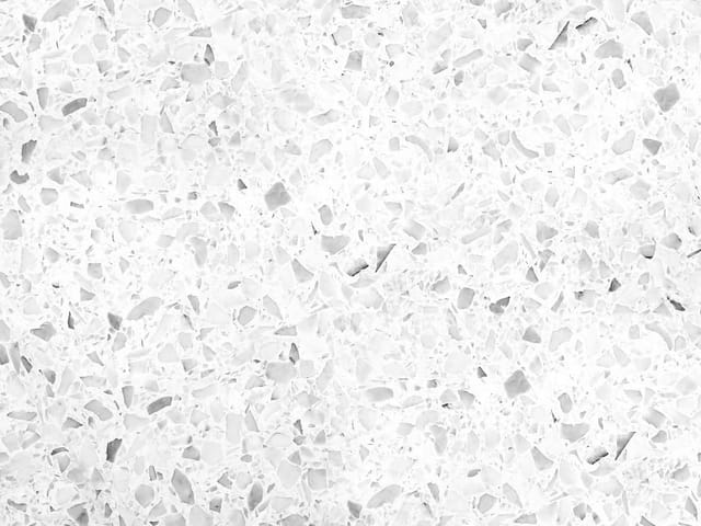 Fototapeta z białą powierzchnią i wzorem lastryko w różnych odcieniach