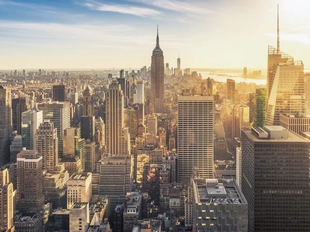 Fototapeta z panoramą miasta, wysokie wieżowce w słonecznym świetle