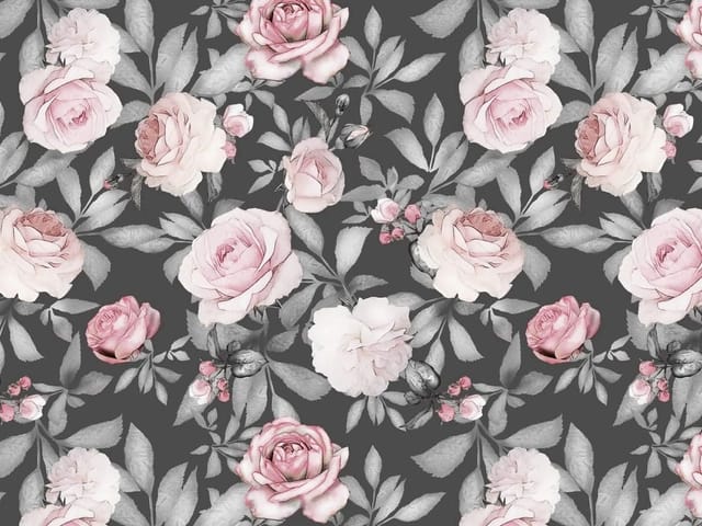 Fototapeta z różowymi różami na ciemnym tle i zielonymi liśćmi