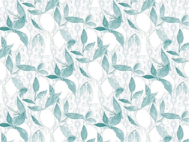 Fototapeta z zielonymi liśćmi i białymi owocami na gałęziach