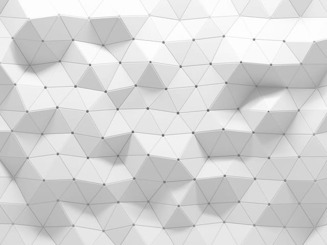 Fototapeta z geometryczną strukturą z trójkątnych paneli 3D