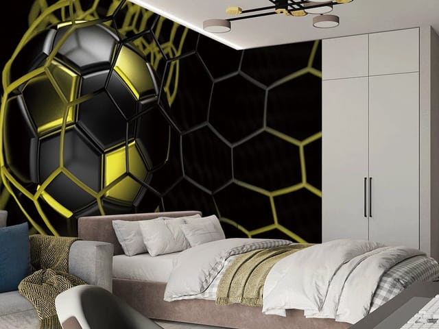 Fototapeta z piłką nożną w żółtej siatce na ciemnym tle