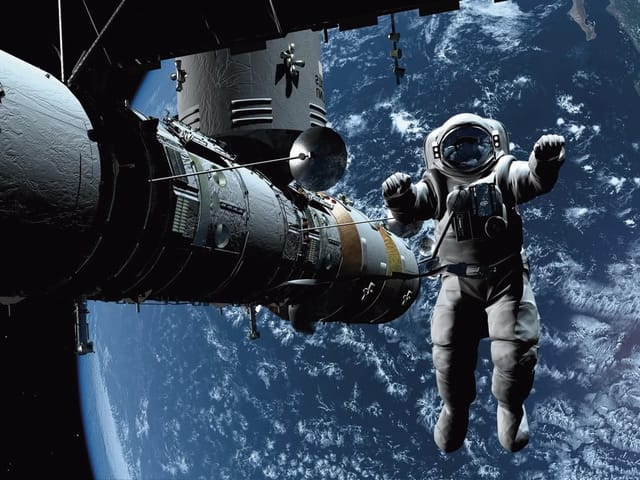 Fototapeta astronauci – astronauta w skafandrze w przestrzeni kosmicznej