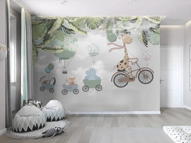 Fototapeta z żyrafą na rowerze i przyczepkami pełnymi zwierząt, liście palmowe i balony