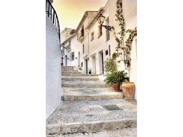 Fototapeta Urokliwe kamienne schody w uliczce (kod: 6397) Fototapeta Urokliwe kamienne schody w uliczce