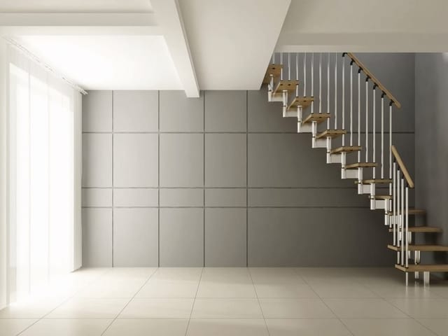 Fototapeta z nowoczesnymi schodami, szarymi ścianami i dużym oknem z zasłonami