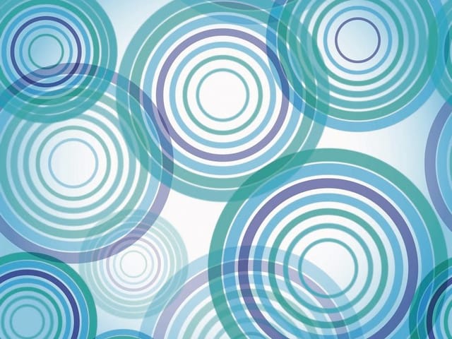 Fototapeta z koncentrycznymi okręgami w odcieniach niebieskiego na jasnym tle