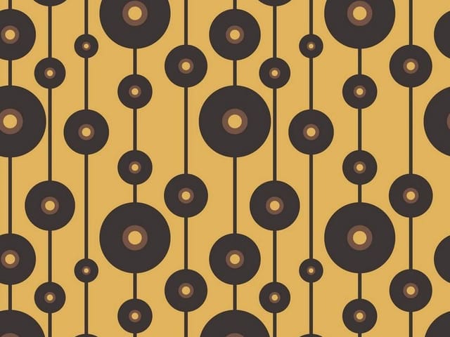 Fototapeta z czarnymi okręgami na żółtym tle, geometryczny wzór