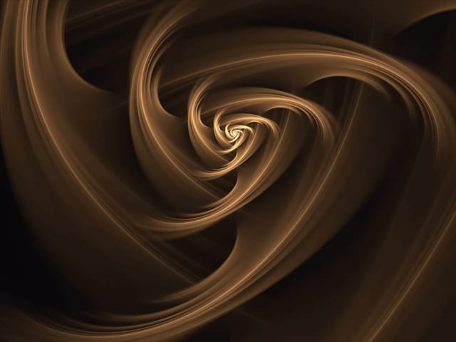 Fototapeta z spiralnym wzorem w odcieniach brązu na ciemnym tle