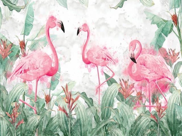 Fototapeta z trzema różowymi flamingami otoczonymi zielenią i kwiatami