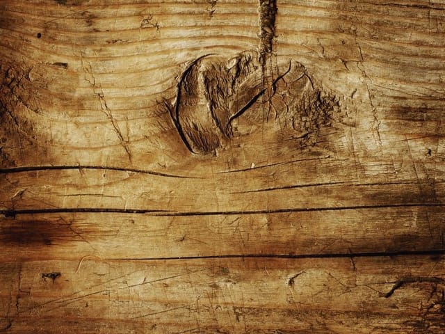 Fototapeta Drewniana powierzchnia z sękiem (kod: 8292) Fototapeta z drewnianą powierzchnią i wyraźnym sękiem na środku