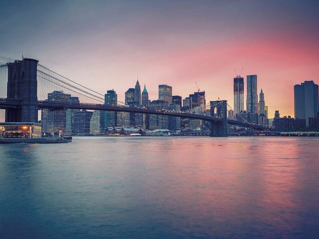 Fototapeta Most nad rzeką o zachodzie słońca (kod: 9942) Fototapeta most nad rzeką o zachodzie słońca z panoramą miasta