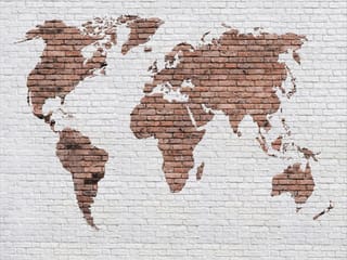 Fototapeta Mapa świata na ceglanej ścianie