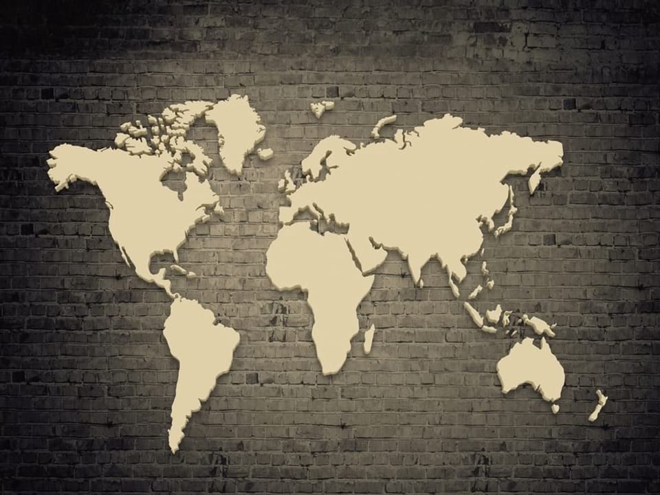 Fototapeta Mapa świata na ceglanej ścianie