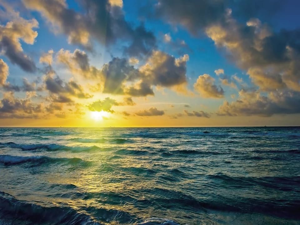 Fototapeta Zachód słońca nad oceanem na wymiar