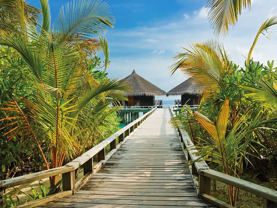 Fototapeta Drewniany pomost do chat