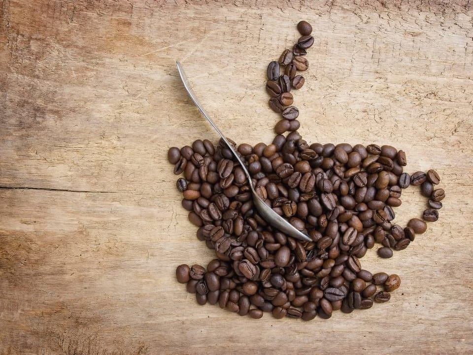 Fototapeta Kawa w filiżance z ziaren