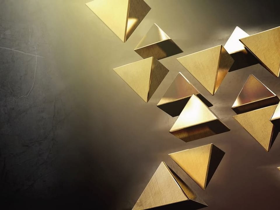 Fototapeta Złote Trójkątne Bryły w Przestrzeni