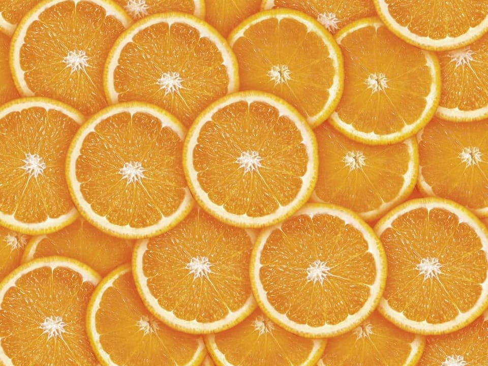 Fototapeta Plasterki pomarańczy w soczystych kolorach