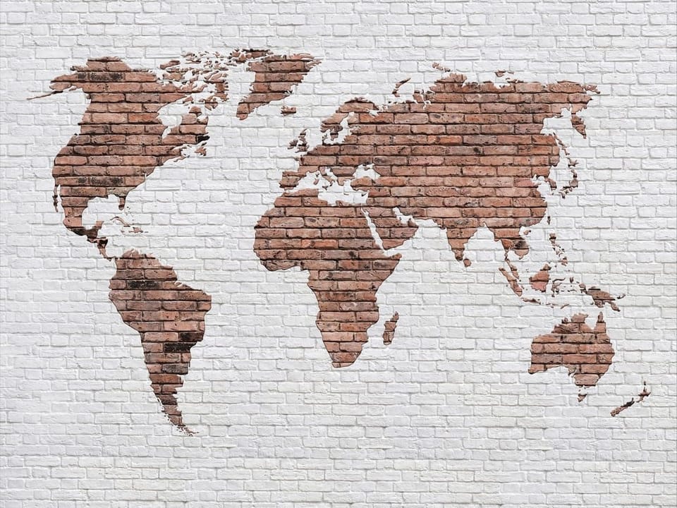 Fototapeta Mapa świata na ceglanej ścianie na wymiar