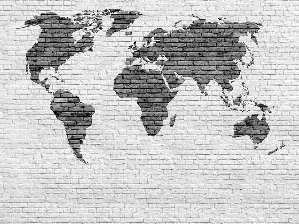 Fototapeta Mapa świata na ceglanej ścianie na wymiar