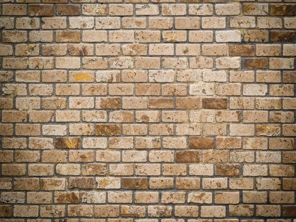 Fototapeta Ściana z cegieł w brązowych odcieniach