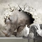 Miniatura fototapety Nosorożec w akcji na ścianie we wnętrzu przedpokoju