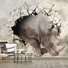 Miniatura fototapety Nosorożec w akcji na ścianie we wnętrzu salonu