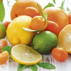 Miniatura fototapety Cytrusowy stół pełen owoców