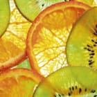 Miniatura fototapety Kolorowy wzór z plastrami kiwi i pomarańczy