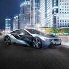 Miniatura fototapety Nowoczesny samochód w miejskiej scenerii