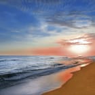 Miniatura fototapety Plaża o zachodzie słońca