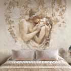 Miniatura fototapety Para w objęciach z liśćmi we wnętrzu sypialni