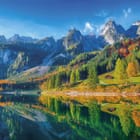 Miniatura fototapety Górski krajobraz z jeziorem i domkami