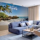 Miniatura fototapety Plaża z palmami i skałami we wnętrzu salonu
