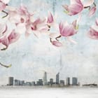 Miniatura fototapety Magnolie na gałęziach z panoramą miasta